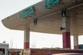 Shot of a toll booth showing the lanes, signs and lights