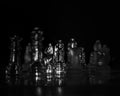 Shot of transparent chess pieces on a black background Royalty Free Stock Photo