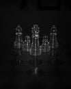 Shot of transparent chess pieces on a black background Royalty Free Stock Photo