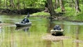 Shot of two boats, Kayak fishing adventure during spring stripped bass spawn in Wildcat Creek