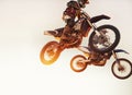 Theyre neck-a-neck. A shot of two motocross riders in midair during a race. Royalty Free Stock Photo