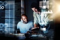 This algorithm should work. Shot of two programmers using a digital tablet while working together on a computer code at Royalty Free Stock Photo