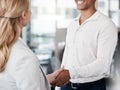 Its always a pleasure. Shot of two unrecognizable businespeople shaking hands in an office at work.