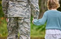 Love, honesty, and connection are cultivated in a family. Shot of a unrecognizable man holding his daughters hand