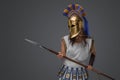 Militray woman from ancient greece with spear and helmet