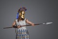 Militray woman from ancient greece with spear and helmet