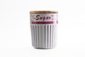 Shot of a white container for sugar with a wooden lid on a white background Royalty Free Stock Photo