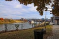 A shot of a white and red steam boat sailing on the Cumberland River near the John Seigenthaler Pedestrian Bridge Royalty Free Stock Photo