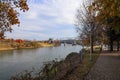 A shot of a white and red steam boat sailing on the Cumberland River near the John Seigenthaler Pedestrian Bridge Royalty Free Stock Photo