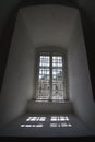 Window in white stone wall with lattice Royalty Free Stock Photo