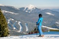 Skier resting on top of the mountain Royalty Free Stock Photo