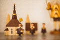 Shot of wooden Christmas singers and a church on shelf Royalty Free Stock Photo