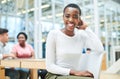 We do it better when we do it together. Shot of a young businesswoman having a meeting with her team in a modern office. Royalty Free Stock Photo