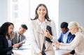 Leading my team to greatness. Shot of a young businesswoman in a meeting with her colleagues. Royalty Free Stock Photo