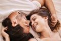 I only have eyes for you. Shot of a young couple having an intimate moment on the bed at home. Royalty Free Stock Photo