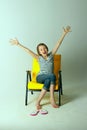 Shot of a young girl stretching her arms and yawning. Royalty Free Stock Photo