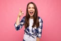 Shot of young happy joyful smiling beautiful brunette woman with sincere emotions wearing trendy check shirt isolated on Royalty Free Stock Photo