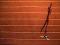 Shot of a young male athlete training on a race track Royalty Free Stock Photo