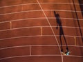 Shot of a young male athlete training on a race track Royalty Free Stock Photo