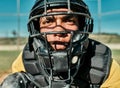 Hes the quickest thinker on the team. Shot of a young player wearing a catchers helmet while playing baseball. Royalty Free Stock Photo