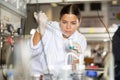 Shot of an young woman using equipment to work in a laboratory Royalty Free Stock Photo