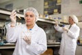 Shot of an young woman using equipment to work in a laboratory Royalty Free Stock Photo