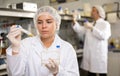 Shot of an young woman using equipment to work in a laboratory Royalty Free Stock Photo