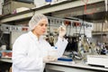 Shot of an young woman using equipment to work in a laboratory Royalty Free Stock Photo