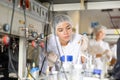 Shot of an young woman using equipment to work in a laboratory Royalty Free Stock Photo