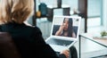 A lifeline for life under lockdown. Shot of a young woman having a counselling session with a psychologist using a video Royalty Free Stock Photo