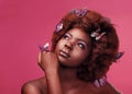 Should I make this my signature look. Studio shot of a beautiful young woman posing topless with butterflies in her hair Royalty Free Stock Photo