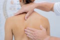 shoulder blades physiotherapist manipulation in doctors hospital office Royalty Free Stock Photo