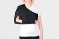 Shoulder Joint Brace. Bandage on the shoulder joint scarf with additional fixation.