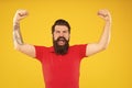 shouting bearded man with moustache in tshirt on yellow background, aggression Royalty Free Stock Photo