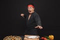 Shouting crazy karate man preparing sushi Royalty Free Stock Photo