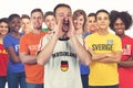 Shouting german football fan with group of other european supporters