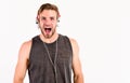 Shouting guy. rock music. new technology in modern life. sexy muscular man listen music. man listen new song isolated on
