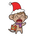 shouting hand drawn line drawing of a monkey carrying christmas gift wearing santa hat