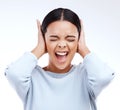 Shouting, woman and hands on ears for noise, silence or denial gesture on studio white background. Anxiety, face and