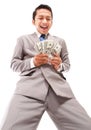 Shouting young businessman holding money