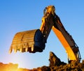 Shovel bucket against blue sky Royalty Free Stock Photo