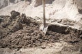 Shovel with a cement. Construction site Royalty Free Stock Photo