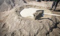 Shovel with a cement. Construction site Royalty Free Stock Photo