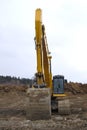 Excavator digger yellow big equipment construction site machine Royalty Free Stock Photo