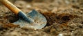 Shovel in Dirt With Surrounding Soil Royalty Free Stock Photo
