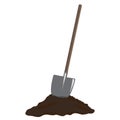 Shovel in heap of dirt