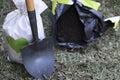 A shovel next to a hole Royalty Free Stock Photo