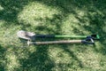 Shovel and pitchfork on green grass Royalty Free Stock Photo