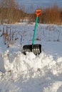 Shovel for snow cleaning sticks out Royalty Free Stock Photo