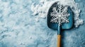 Shovel with Snowflake Pattern on Light Background with Space for Text Royalty Free Stock Photo